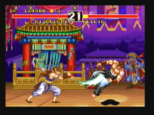 Fighter's History Dynamite (Zeebo) screenshot: Feilin finishes Misogushi with a Mantis Chop.