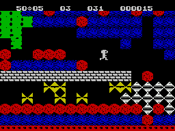 Boulder Dash (ZX Spectrum) screenshot: Crush the yellow things with a boulder, and they turn into diamonds!