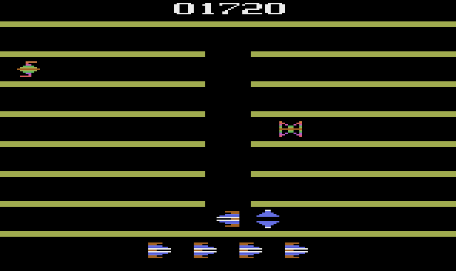 Turmoil (Atari 2600) screenshot: The sentry ship is just about to get you! You can loose ships (lives) quickly in this game