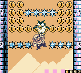 Wario Land II (Game Boy Color) screenshot: Have a giant owl fly you