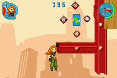 Kim Possible 2: Drakken's Demise (Game Boy Advance) screenshot: Climbed in a iron platform using only one hand: now, Kim is about to collect some helpful items...