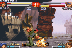 The King of Fighters EX2: Howling Blood (Game Boy Advance) screenshot: Ralf connects a massive 12-hit combo on Choi through his grabbing DM Horse Power Vulcan Punch.