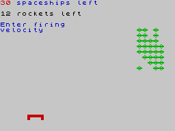 Cassette 50 (ZX Spectrum) screenshot: Using a bombing arc to remove as many of those green blobs as possible