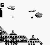 Choplifter III (Game Boy) screenshot: Under attack by ordnance, a bomber and a bird