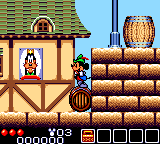 Legend of Illusion starring Mickey Mouse (Game Gear) screenshot: Rolling on a barrel!
