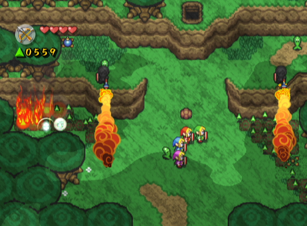 The Legend of Zelda: Four Swords Adventures (GameCube) screenshot: Avoid the fire and explosions