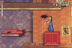 Lemony Snicket's A Series of Unfortunate Events (Game Boy Advance) screenshot: shooting apples at spider