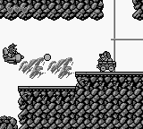 Disney's TaleSpin (Game Boy) screenshot: Navigating your way though a cave.