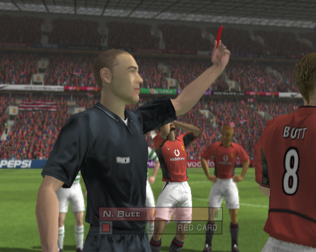 Club Football: 2003/04 Season (PlayStation 2) screenshot: An in-game shot. What is nice about this is the reaction of the other Manchester players in the background.<br>Camera angles can be changed by the player<br><br>Manchester United game