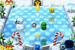 Mario Pinball Land (Game Boy Advance) screenshot: A typical ice level: ice puppets, pines, colorful canes... and Shy Guys?