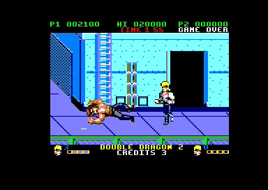 Double Dragon II: The Revenge (Amstrad CPC) screenshot: Boss down on the ground (128K floppy disk version)