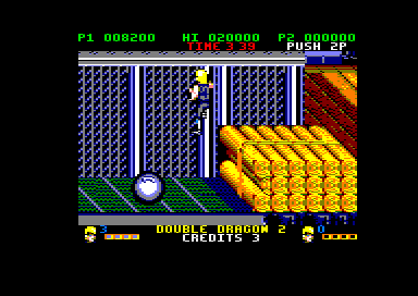 Double Dragon II: The Revenge (Amstrad CPC) screenshot: Climbing a gate (128K floppy disk version).