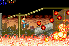 Contra Advance: The Alien Wars EX (Game Boy Advance) screenshot: The land in flames shows its fury in form of incandescent and solid magma.