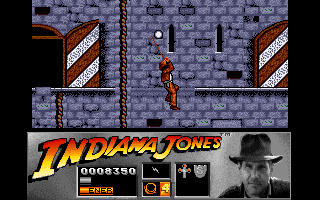 Indiana Jones and the Last Crusade: The Action Game (Amiga) screenshot: Level 2 - Swinging across a ledge using Indy's trusty whip.