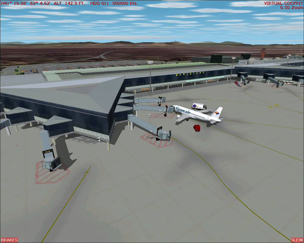 Scenery Spain 2: Spanish Airports (Windows) screenshot: Barcelona airport - a static aircraft at the main terminal.