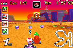 Mario Kart: Super Circuit (Game Boy Advance) screenshot: Hit a teepee at the Sunset Wilds track and a Shy Guy will jump on your back to slow you down.