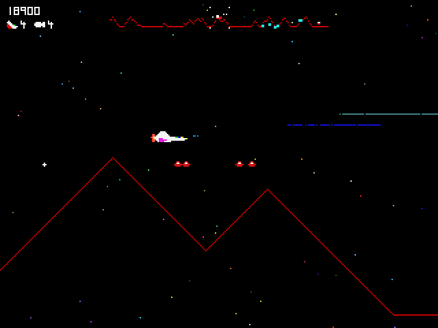 Defender (Windows 3.x) screenshot: One kind of alien craft leaves these small red homing mines behind when it explodes, they are very hard to shake off