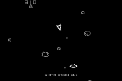 Pong / Asteroids / Yars' Revenge (Game Boy Advance) screenshot: A game of Asteroids