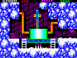 Rick Dangerous 2 (ZX Spectrum) screenshot: Level 2 - The Ice Caverns of Freezia: using a trigger do deactivate the ground blades. An indestructible moveable saw guards the access on the right.