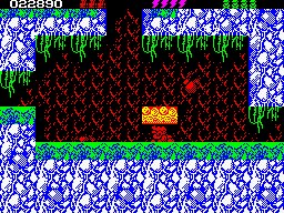 Rick Dangerous 2 (ZX Spectrum) screenshot: Level 3 - Forests of Vegetablia: totally <i>Raiders of the Lost Ark</i> atmosphere. Stalactites are falling from the ceiling of the cave.