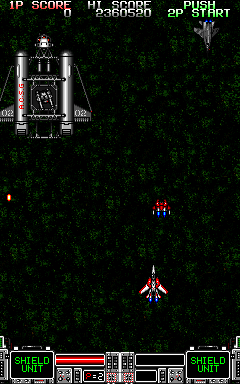 Strike Gunner S.T.G. (Arcade) screenshot: A power-up to collect.