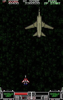 Strike Gunner S.T.G. (Arcade) screenshot: Another plane.