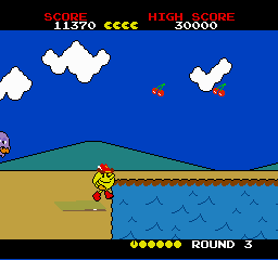 Pac-Land (TurboGrafx-16) screenshot: The springboard allows you to jump over the pool