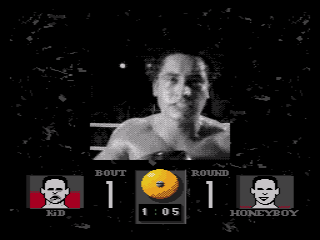 Prize Fighter (SEGA CD) screenshot: Landing a punch cuts into a different video clip.