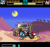 SNK Gals' Fighters (Neo Geo Pocket Color) screenshot: Using her powerful legs, Shermie immoblilizes Athena in an super enlacing move named Shermie Spiral.