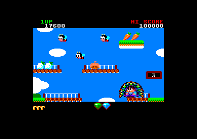 Rainbow Islands (Amstrad CPC) screenshot: The bees seem to be coming out of that pumpkin