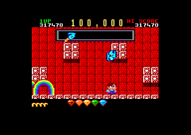 Rainbow Islands (Amstrad CPC) screenshot: Each time you destroy a boss, you'll receive 100,000 points