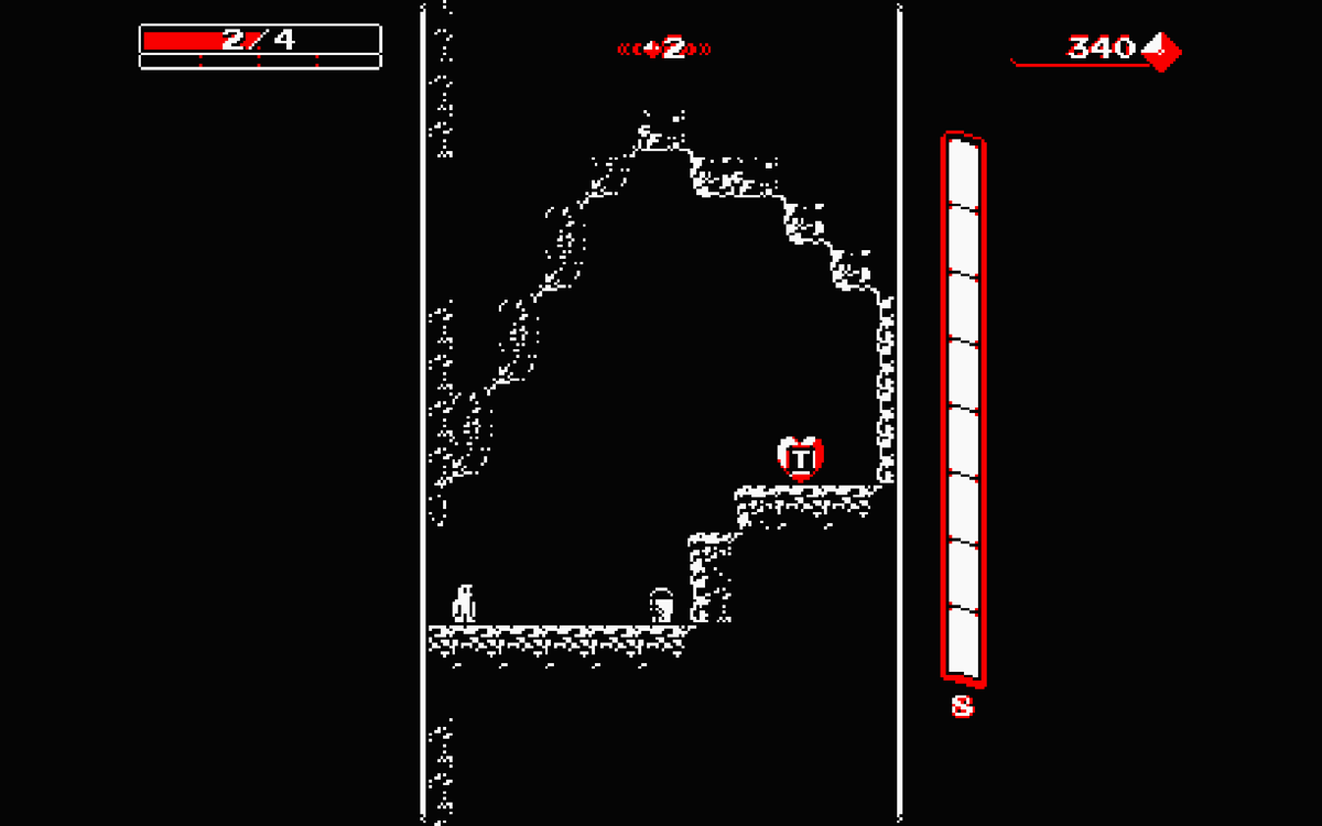 Downwell (Windows) screenshot: A cave with a weapon modifier