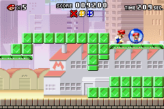 Mario vs. Donkey Kong (Game Boy Advance) screenshot: Pick up the mini Mario to get to a bonus round
