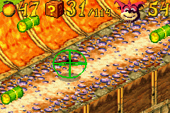 Crash Bandicoot 2: N-Tranced (Game Boy Advance) screenshot: Riding the Atlasphere, Crunch must escape from a row of explosive barrels to progress in the level.