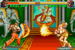 Super Street Fighter II: Turbo Revival (Game Boy Advance) screenshot: To protect himself from Dee Jay's Max Out, Dhalsim strikes back with his Yoga Flame.
