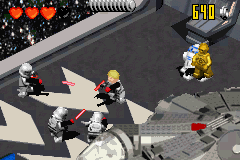 LEGO Star Wars II: The Original Trilogy (Game Boy Advance) screenshot: Luke, followed by the two droids, makes way in the Death Star hangar