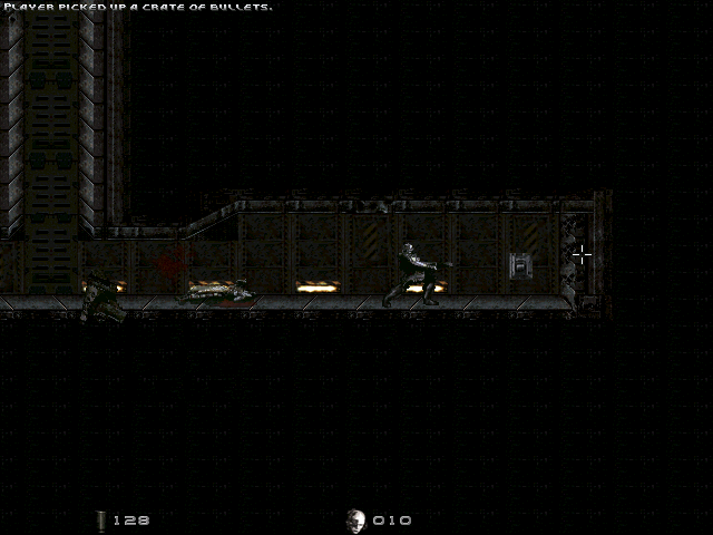 Genocide: Remixed Version (Windows) screenshot: Here the player has just collected an ammo crate.<br>Ahead is a switch. Switches are operated by the down arrow, they operate lifts and open/close locked doors