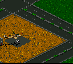 Jungle Strike (SNES) screenshot: Pick up some fuel barrels