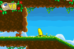 Curious George (Game Boy Advance) screenshot: The Yellow Hat acts as a Checkpoint