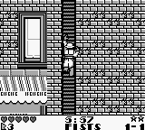 Dick Tracy (Game Boy) screenshot: Climbing a ladder