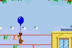 Curious George (Game Boy Advance) screenshot: Watch out for other peoples' washing!
