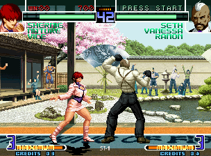 The King of Fighters 2002: Challenge to Ultimate Battle (Neo Geo) screenshot: Seth uses his move Back Blow in the instant that Shermie ends her move Baku New Suplex: advantage!