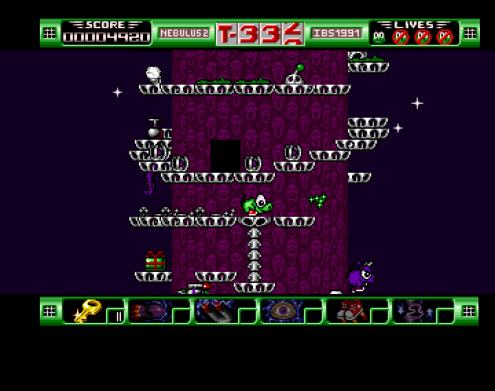 Nebulus 2: Pogo a gogo (Amiga) screenshot: Collecting gifts for bonus items, keys, rockets, magnets and more