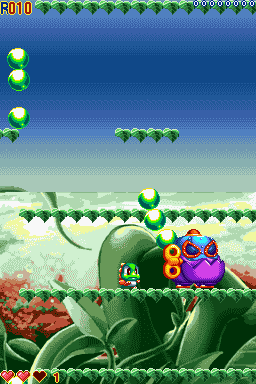 Bubble Bobble Revolution (Nintendo DS) screenshot: Fighting the first boss.
