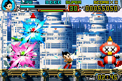 Astro Boy: Omega Factor (Game Boy Advance) screenshot: Using the machine gun (in the bum?)