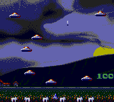 Taito's Super Space Invaders (Game Gear) screenshot: Cattle mutilation round