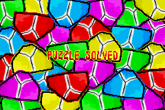 It's Mr Pants (Game Boy Advance) screenshot: A colorful wipe appears when you clear the puzzle