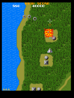 Xevious 3D/G+ (PlayStation) screenshot: Blowing up the structures down below.