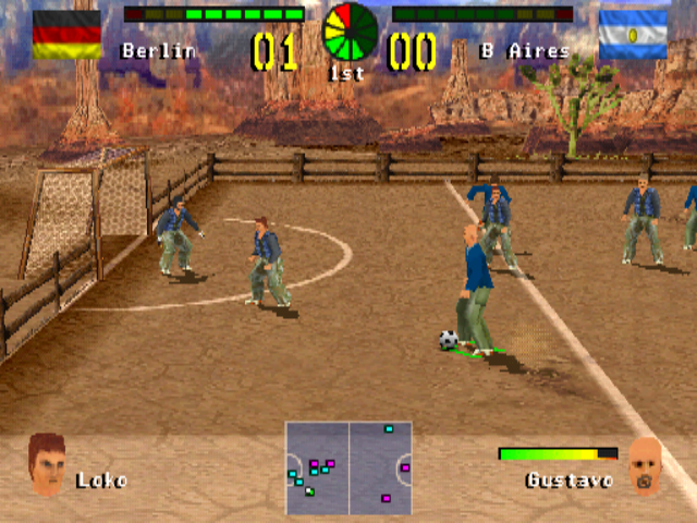 Chris Kamara's Street Soccer (PlayStation) screenshot: Playing on the Death Valley pitch<br>A bit tricky this match as the two teams look so similar<br>This picture also shows the player's power meter triggered by holding CROSS
