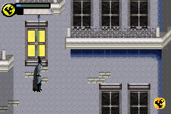 Batman: Vengeance (Game Boy Advance) screenshot: With the grappling beam, Batman can access high places and go ahead.